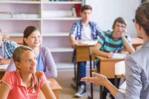 Group,Of,Students,Listening,To,The,Teacher,In,The,Classroom